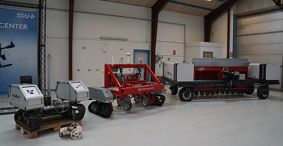 Three agricultural robots in SDU UAS Test Center's hangar